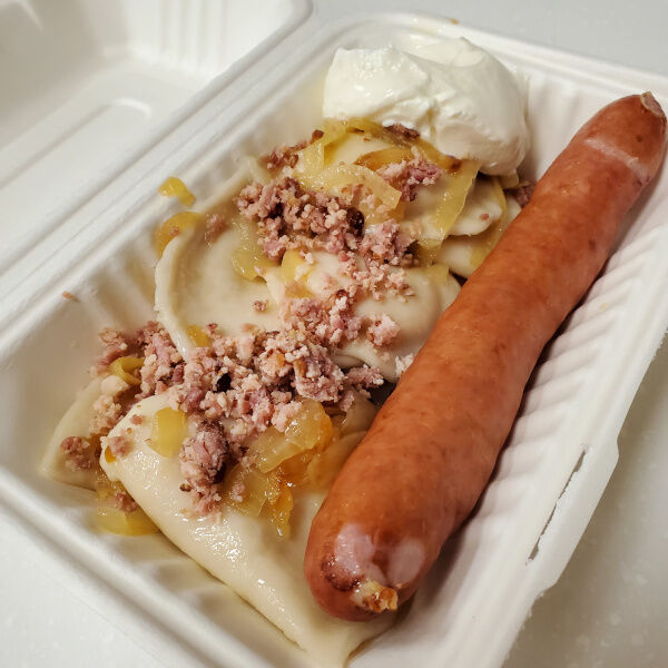 the hot perogy lunch: six perogies, one Kuba Dog, onions, bacon, and sour cream